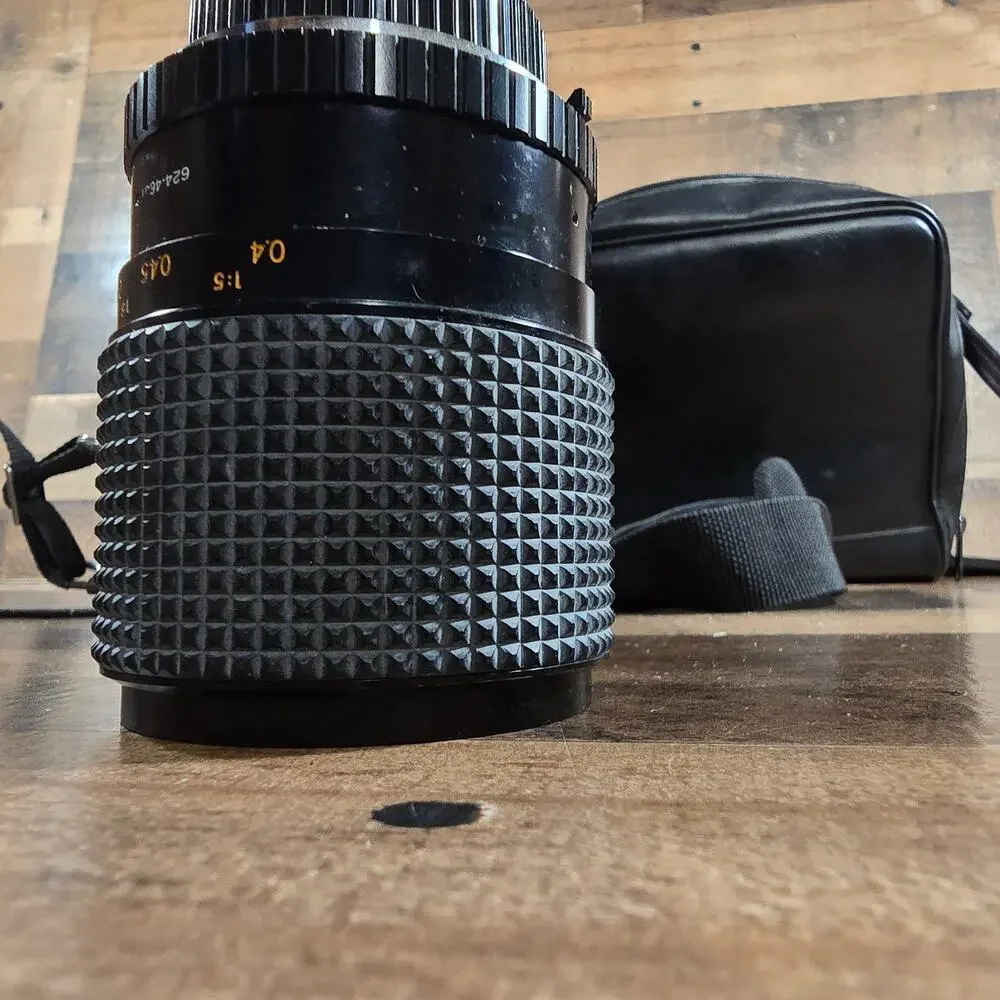 Minolta X370 with a JC Penny f=80 to 200mm zoom lens and prospect f=28-70mm lens